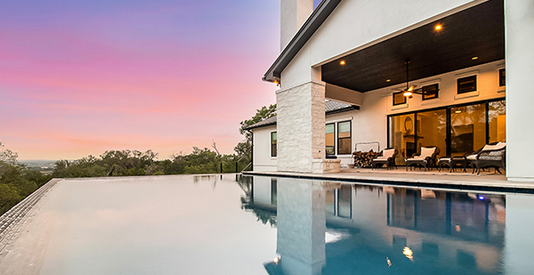 Spring Branch Texas luxury home with modern architecture, resort-style pool, and expansive Hill Country views